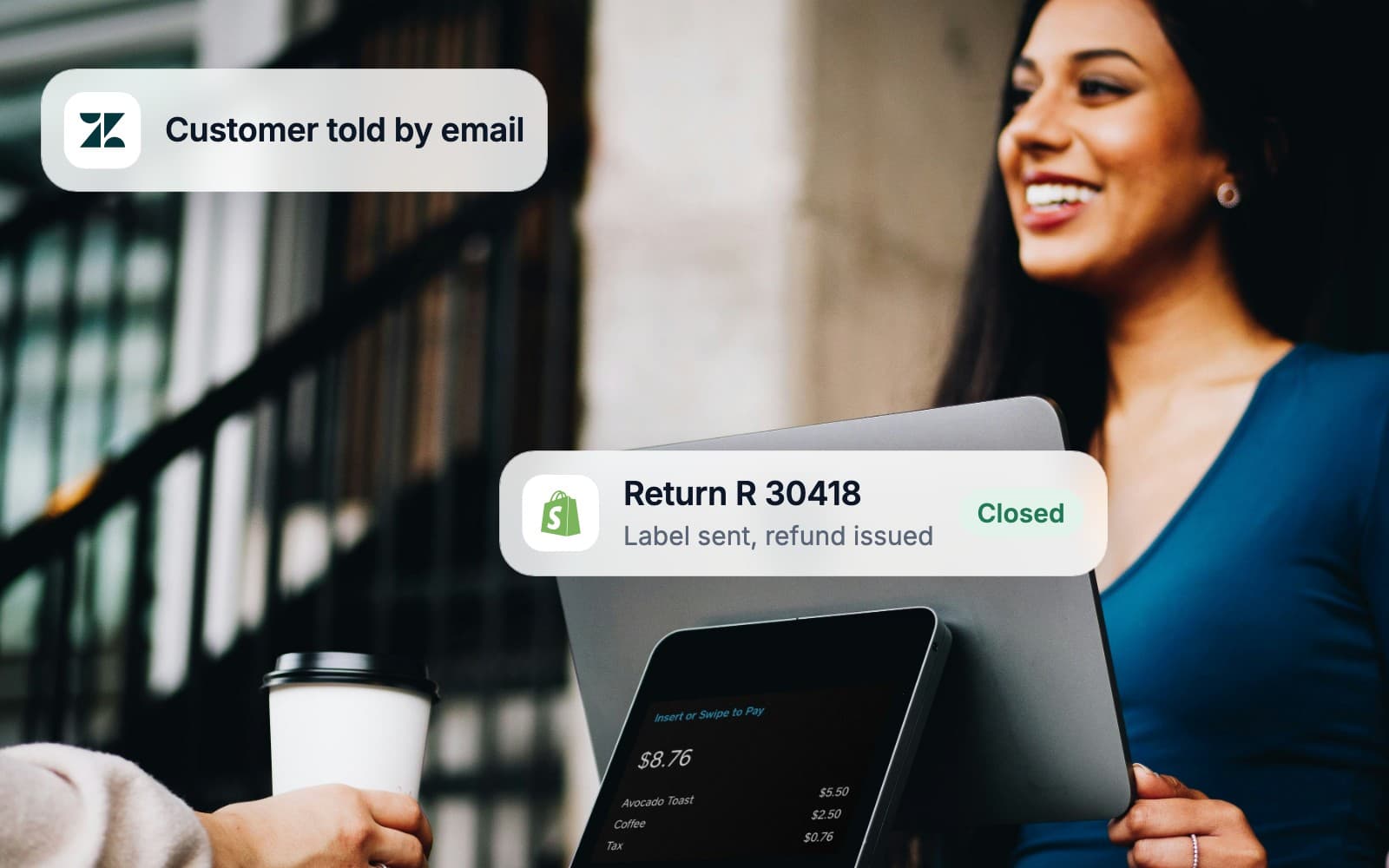 A shop assistant smiling at the till while a return is refunded automatically